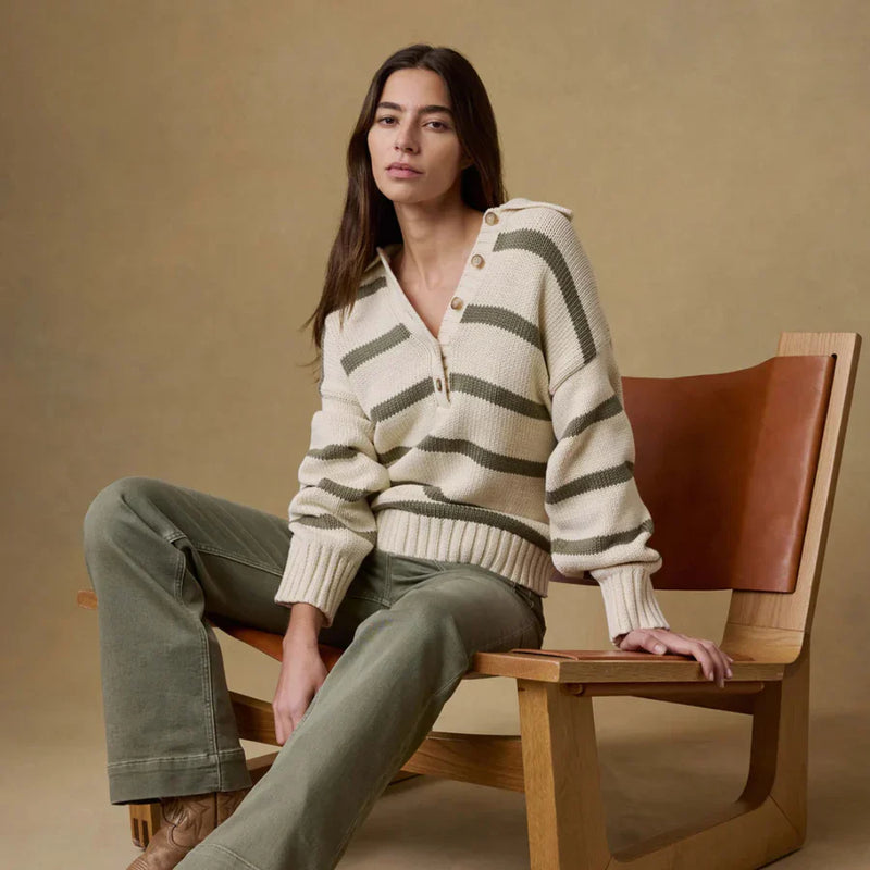 Model wearing a sweater from LADDER, designed by Faherty.