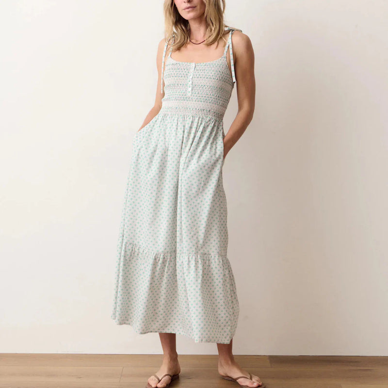 Woman wearing LADDER’s Carmen smoked dress, by Marina Layer.