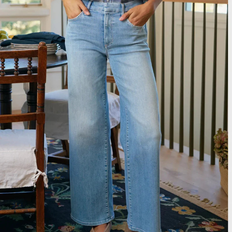 Woman wearing a pair of jeans from LADDER, designed by Frank & Eileen.